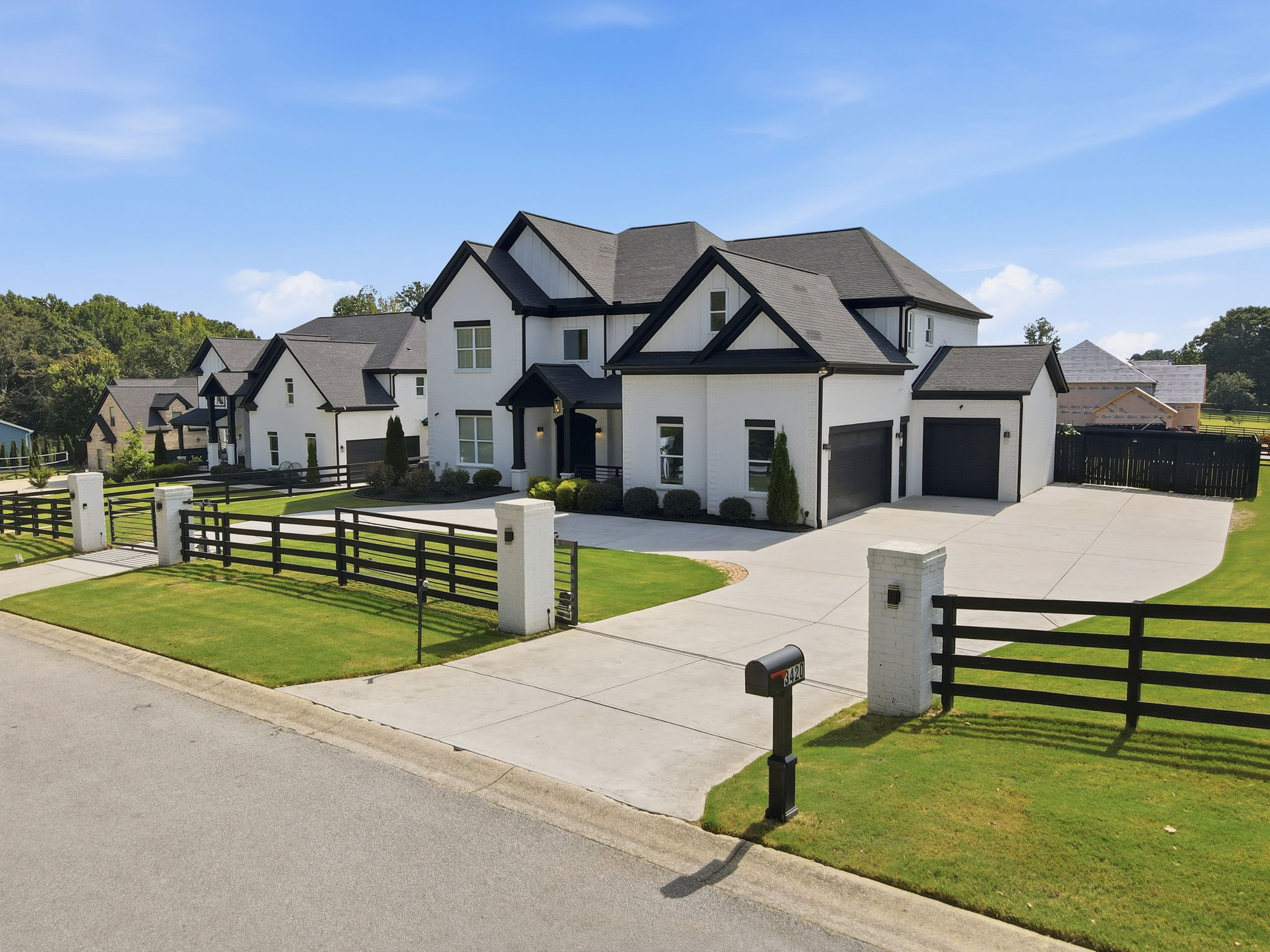 3420 Old Oaks Road | Custom Home for Sale in Buford GA Custom home for sale at 3420 Old Oaks Road in Buford, GA with two gated entrances, three-car garage and private lot