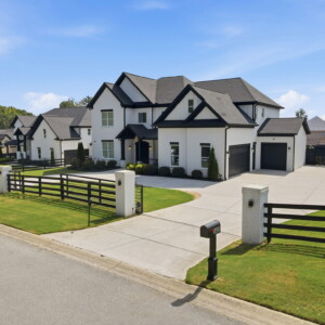 3420 Old Oaks Road — an exceptional custom-built home in Buford, Georgia featuring nearly 5,000 square feet, two gated entrances, a three-car garage and no HOA. Custom home for sale at 3420 Old Oaks Road in Buford, GA with two gated entrances, three-car garage and private lot